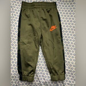 Nike Kids Olive and Black Joggers with Orange Logo
